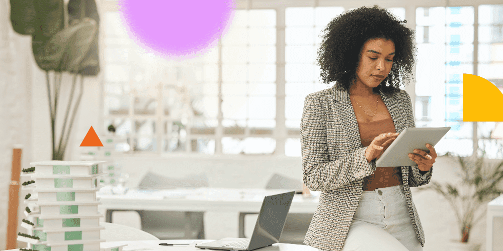 Woman woking on Tablet Focused woman working on a tablet for enhanced efficiency and productivity